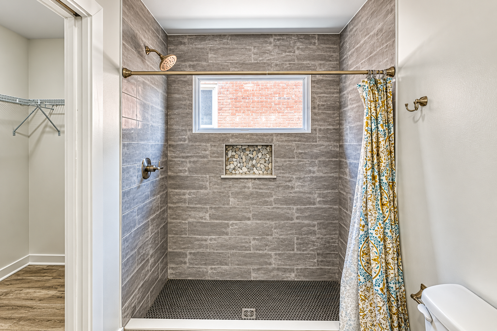 Custom tile shower installation by Legacy Flooring Solutions